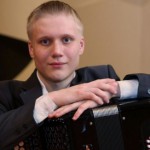 Александр Комельков