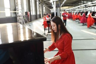 Китайские пианисты установили рекорд Гиннесса по коллективной игре на фортепиано