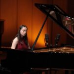 Ноа Капелюшник во время выступления на первом туре Grand Piano Competition. Фото - Владимир Гердо