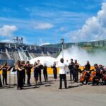 Сибирский юношеский оркестр сыграл на фоне водосброса Красноярской ГЭС
